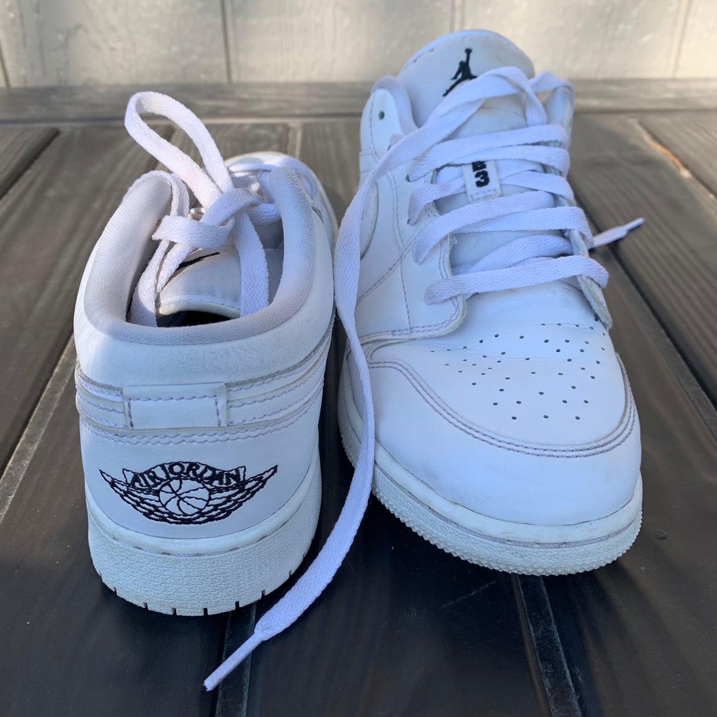 White Jordan 1 Low Black Tips